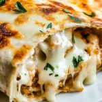 Delicious Garlic Chicken Wraps with melted cheese and herbs, perfect for a quick and tasty dinner