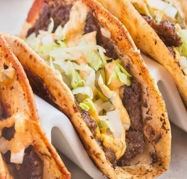 Delicious Smash Burger Tacos with beef patty and toppings