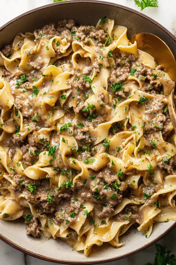 Rich creamy beef and noodles with savory sauce and fresh herbs, a cozy one-pan dinner perfect for family nights